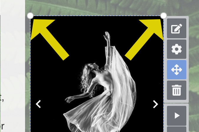 Screenshot showing white resizing handles at the corners of selected content, used to adjust the size of the content.