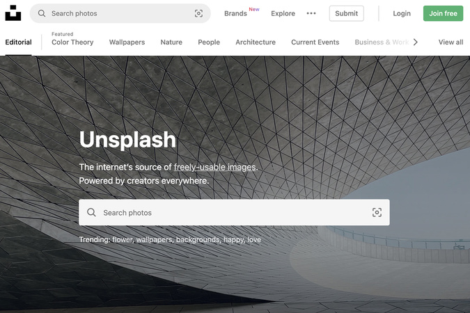 Unsplash homepage showing search photos bar for browsing free high‑quality photos.